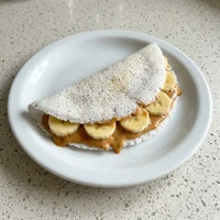 Tapioca de Banana com Pasta de Amendoim, Raiz & Folha